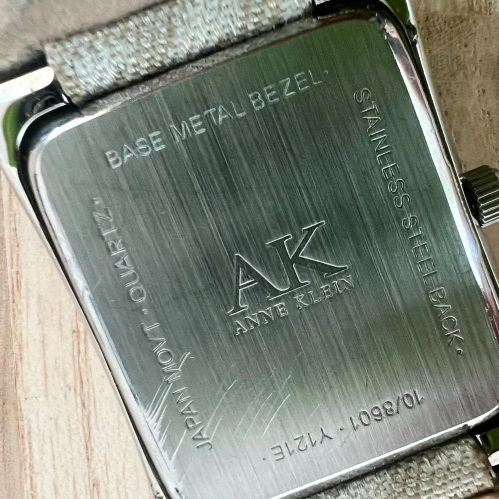 Anne Klein ladies rectangular silver tone dress watch NEW BATTERY